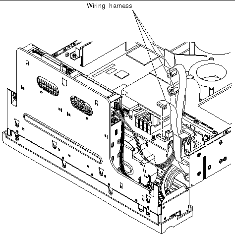 This figure shows the PDB wiring harnesses being disconnected from the system board.